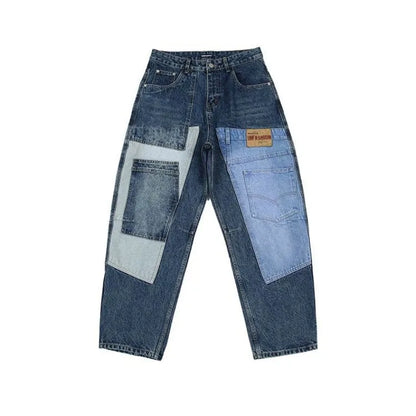 Pair of blue jeans with patchwork design on a white background