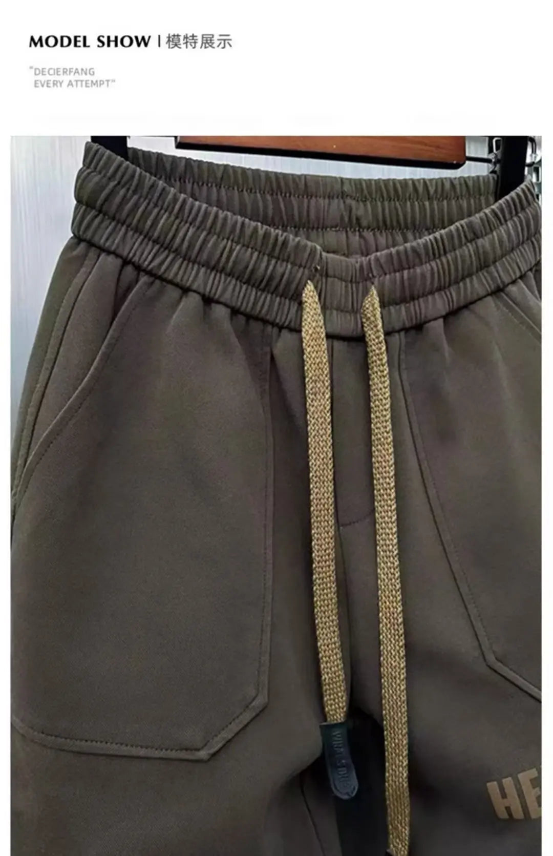 Brown pants with drawstring on a plain background