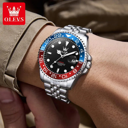 Wristwatch with a distinctive red and blue bezel on a person's wrist, branded 'OLEVS'.