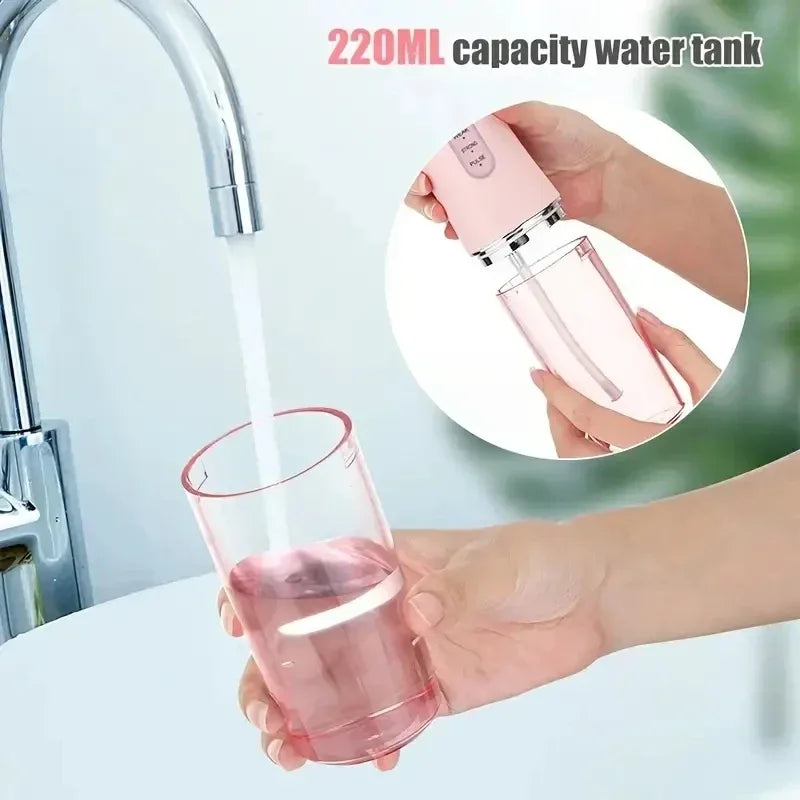 Pink water bottle being filled with water from a faucet, with a close-up inset showing the bottle's capacity.