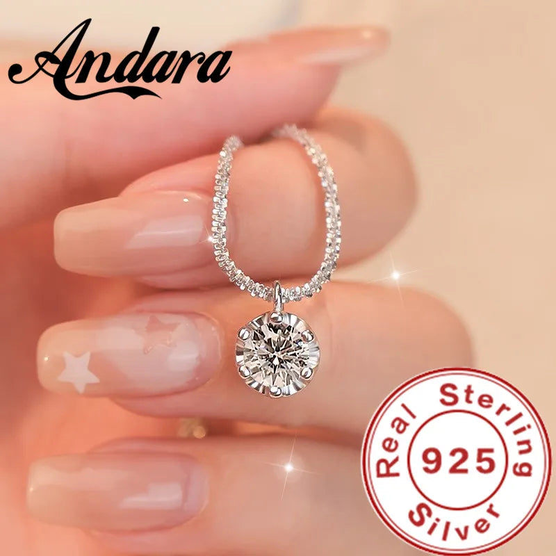 Silver ring with a large diamond on a hand, featuring the Andara brand and 'Real Sterling 925' stamp.