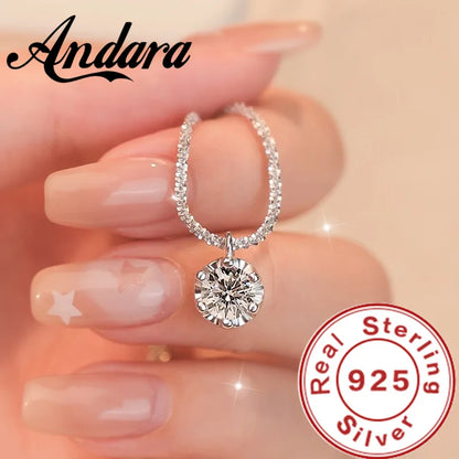 Silver ring with a large diamond on a hand, featuring the Andara brand and 'Real Sterling 925' stamp.