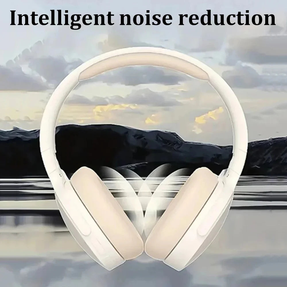 White headphones with 'Intelligent noise reduction' text against a mountain and sky background