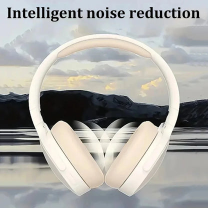 White headphones with 'Intelligent noise reduction' text against a mountain and sky background