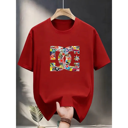 Red t-shirt with colorful graphic design on a hanger against a gray background