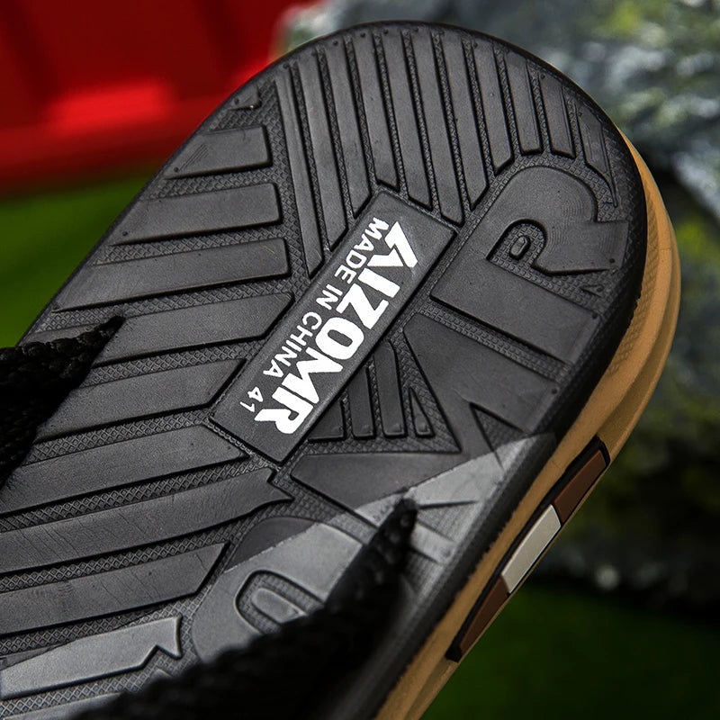 Close-up of a shoe sole with a brand label on a blurred background
