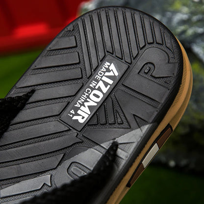 Close-up of a shoe sole with a brand label on a blurred background