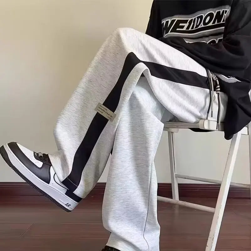 Sanitary pants, color blocked sports pants, lazy teenage season, trendy flu pants, thin men's loose straight leg, relaxed and ha
