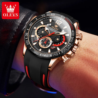 Luxury watch with black strap and red accents on a wrist, branded OLEVS.