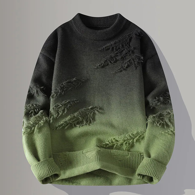 Green and black sweater with distressed design on a gray background
