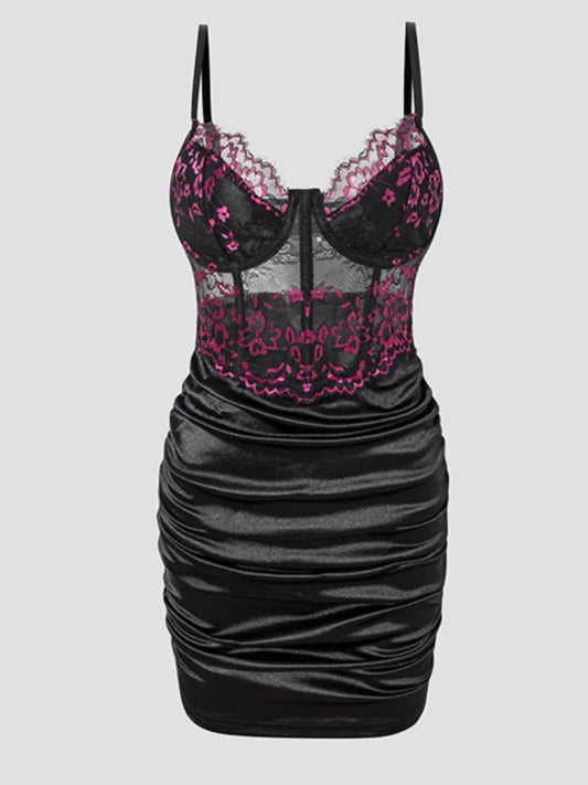 Black satin nightgown with pink lace detailing on a white background