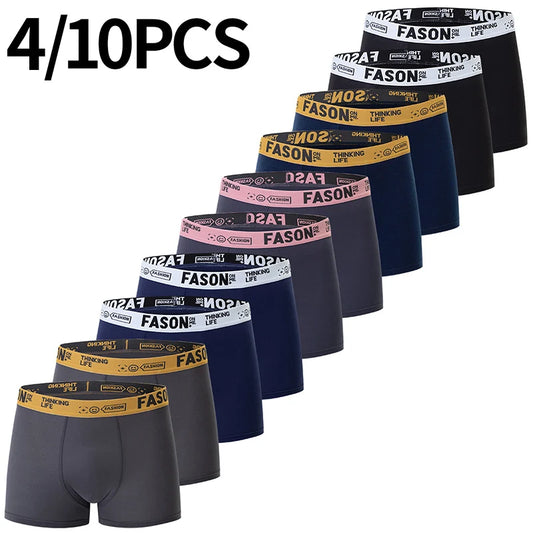 Multiple pairs of men's boxer briefs with visible branding on a white background