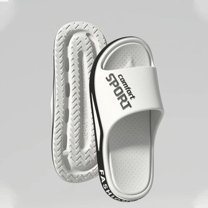 White slide sandals with 'Comfort Sport Fashion' text on a light gray background