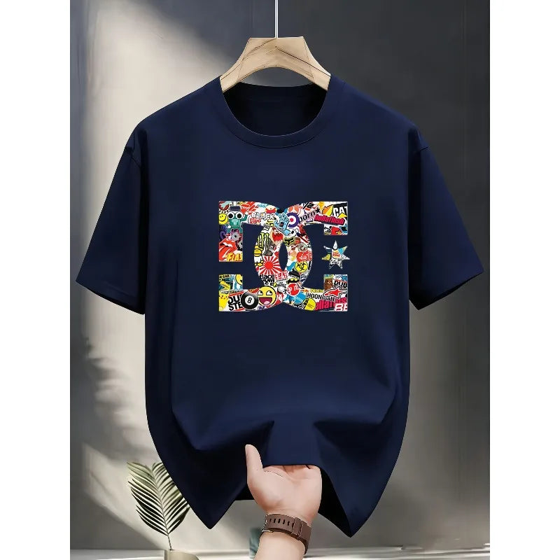 Navy blue t-shirt with colorful graphic design on a hanger against a neutral background