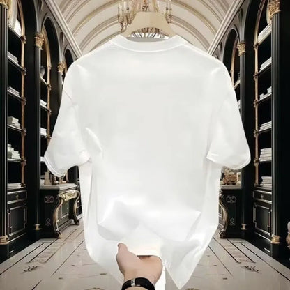 White shirt held up in front of a library setting