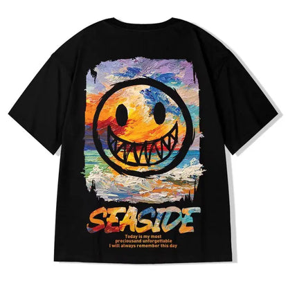 Black t-shirt with a colorful smiley face design and 'Seaside' text on a white background