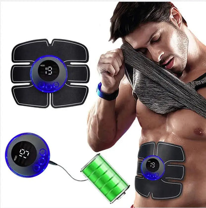 Man using an electronic muscle stimulator with digital display and green power cable.
