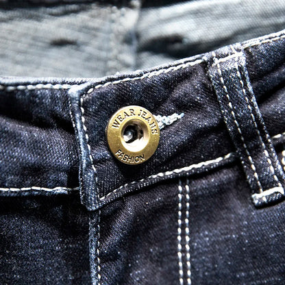 Close-up of a button on a denim jacket with 'Wear Jeans Fashion' branding.