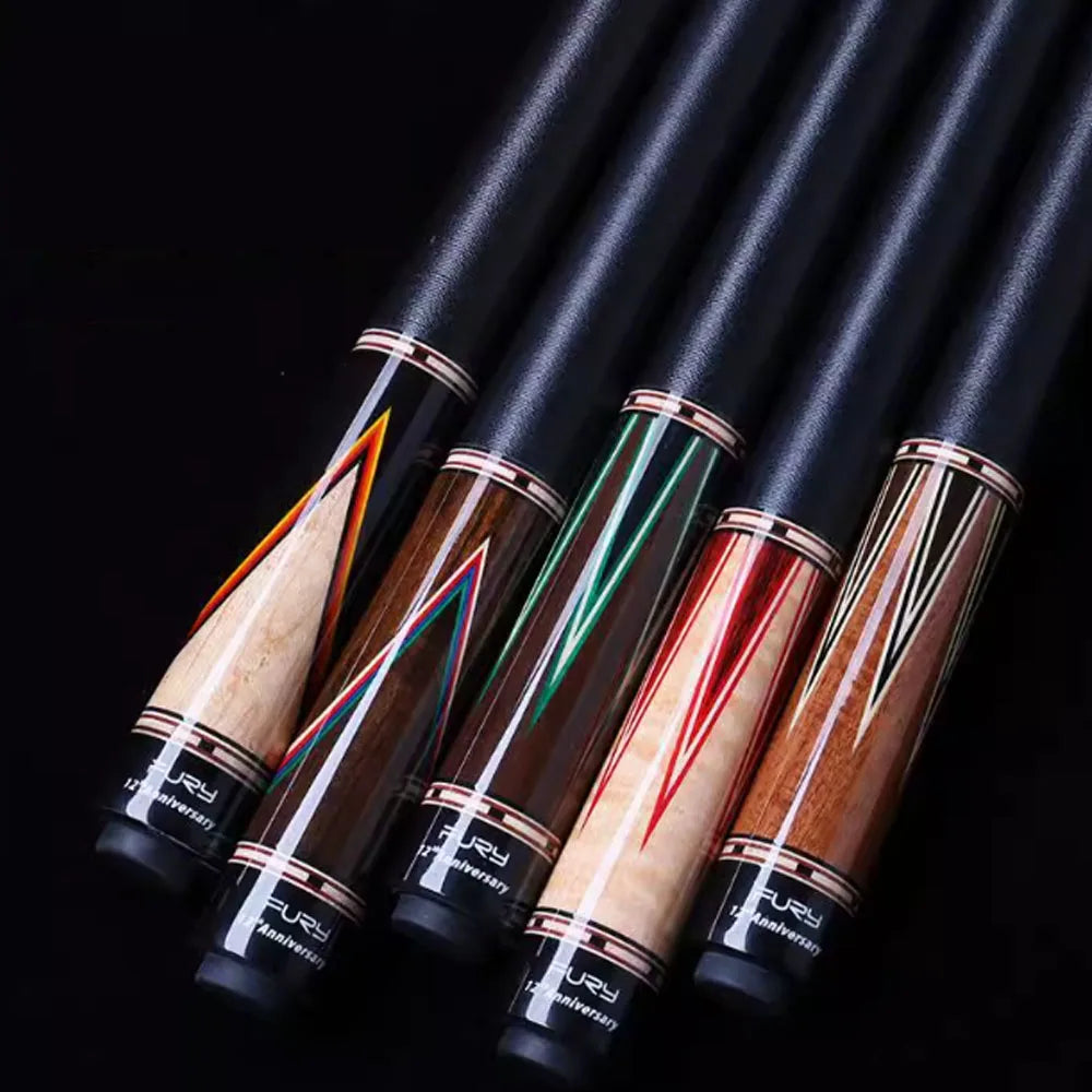Five pool cues with different colored shafts and black grips on a dark background