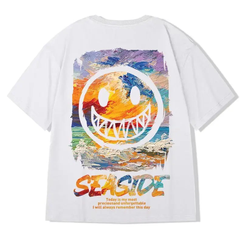 White t-shirt with a colorful smiley face design and 'Seaside' text on a white background