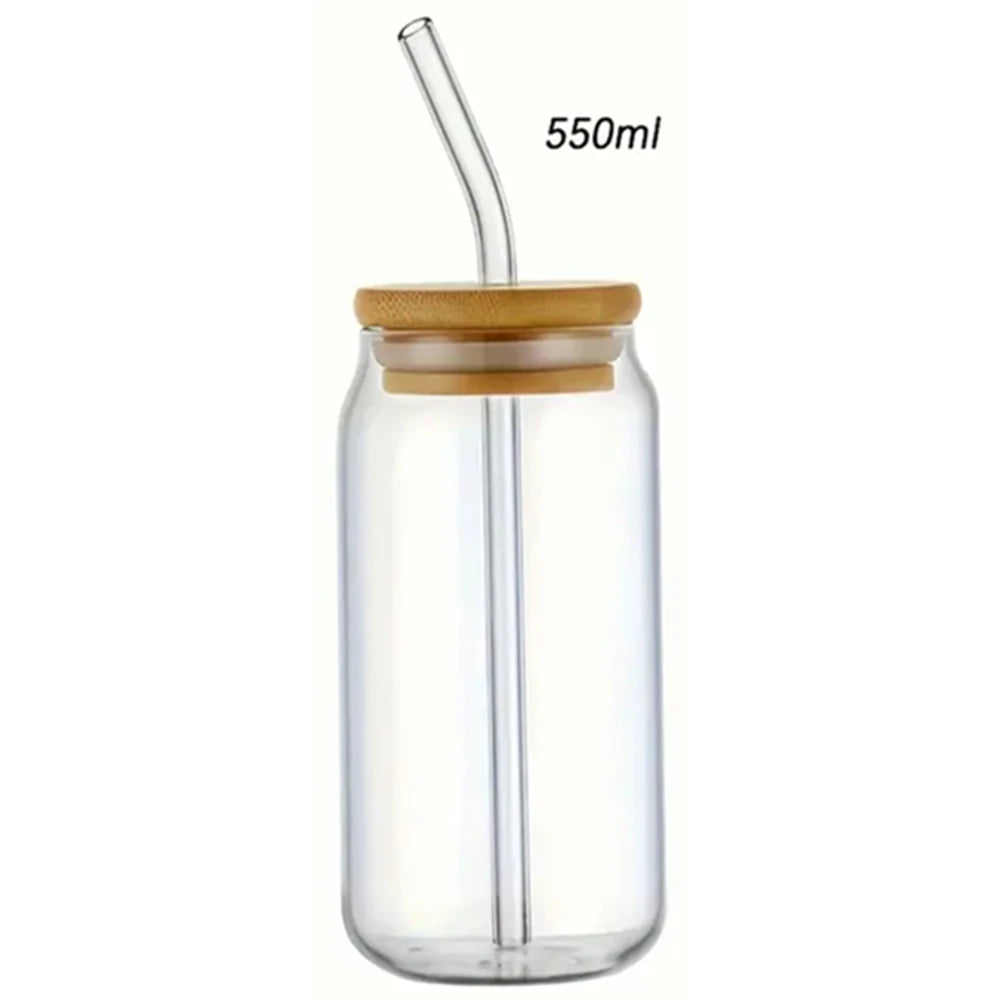 Clear glass jar with wooden lid and straw, 550ml capacity, on a white background