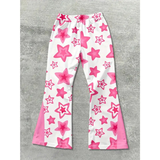 White pants with pink star pattern on a gray surface