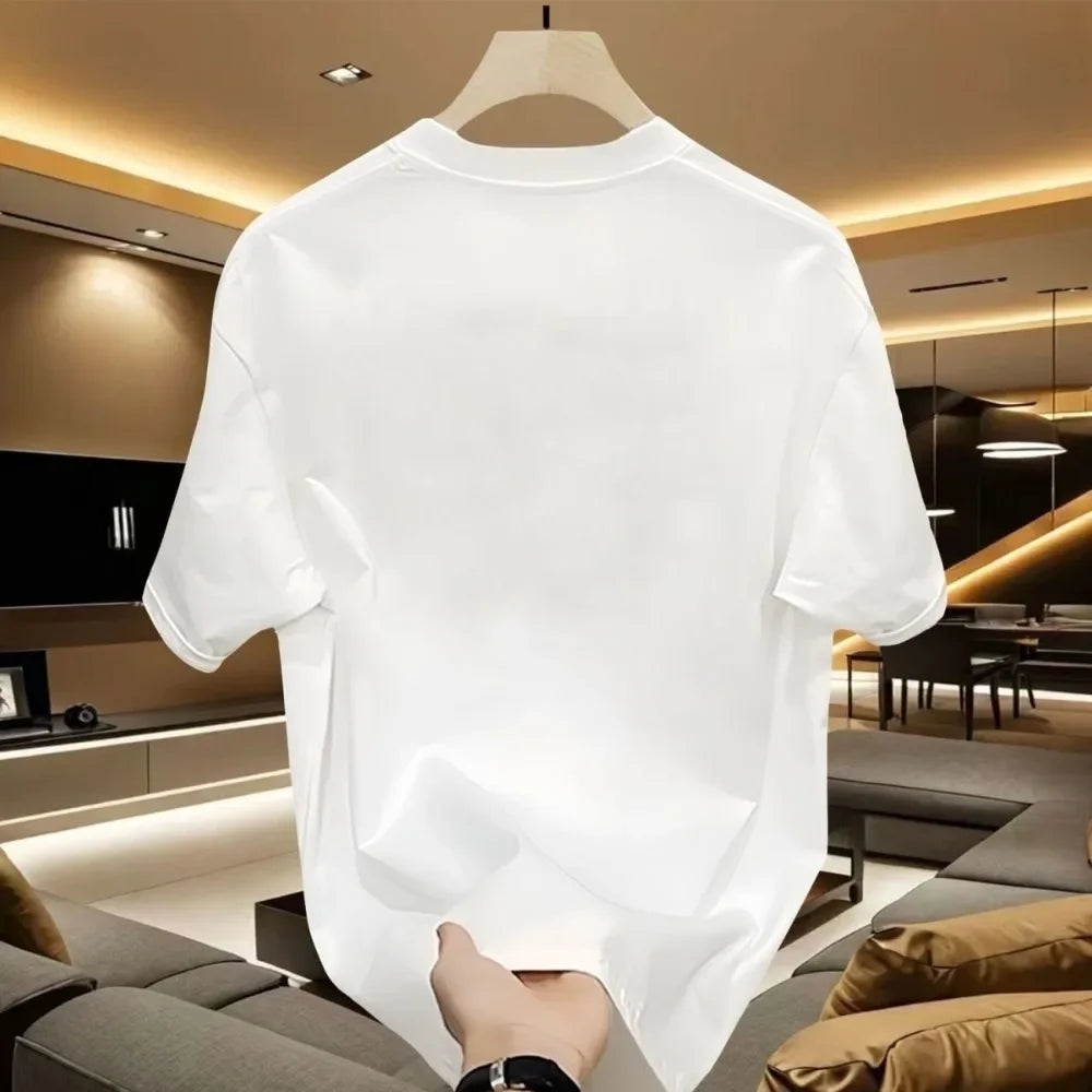 White t-shirt on a hanger with a modern interior background