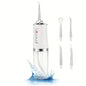 White dental water flosser with additional nozzles on a white background