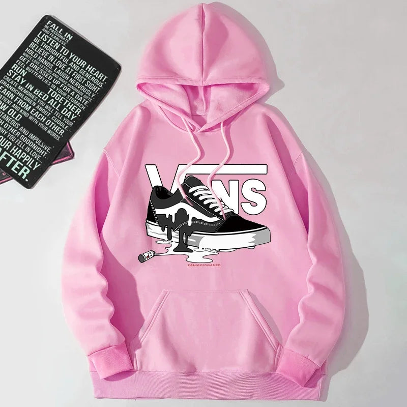 Pink hoodie with Vans shoe graphic on a light gray background