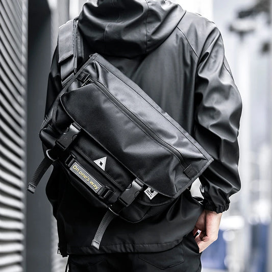 Person wearing a black backpack with visible branding in an urban setting