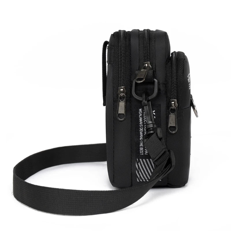 Black tactical pouch with multiple zippers on a white background