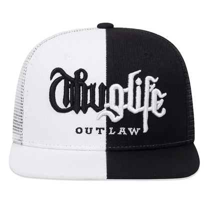 Black and white cap with 'Outlaw' text on a white background