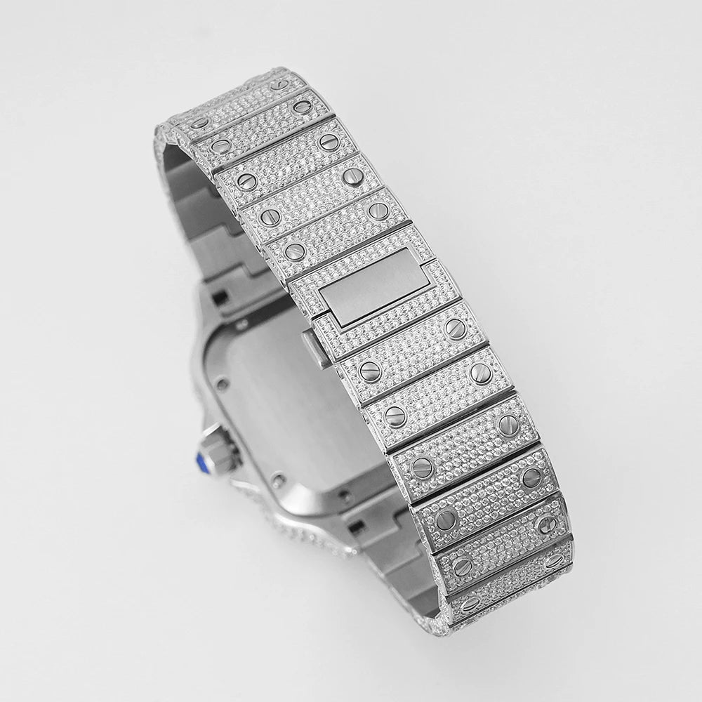 Silver watch with a detailed band on a light gray background