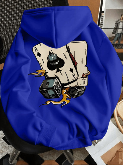 Blue hoodie with a graphic design of playing cards and dice on a chair.