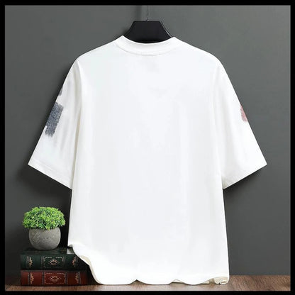 White t-shirt with black text on a dark gray background