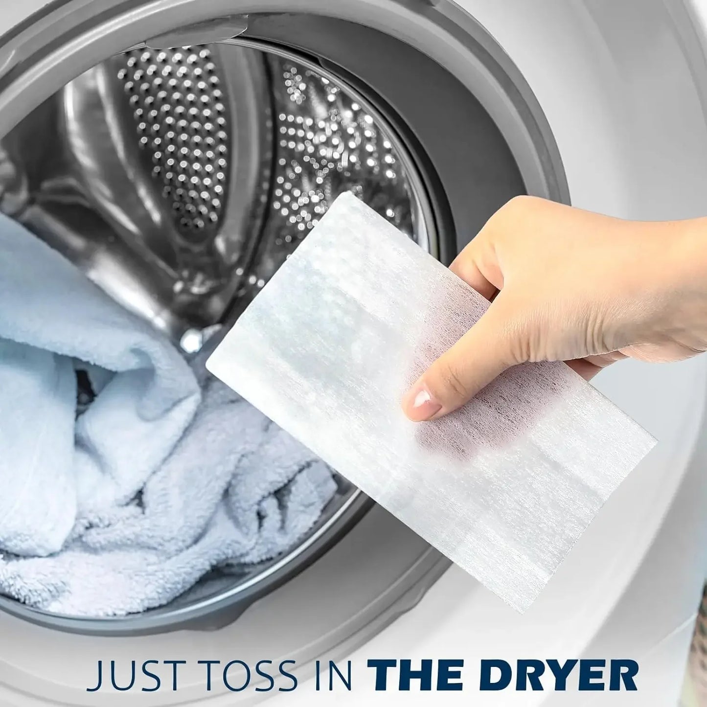 Hand holding a white dryer sheet with text 'Just toss in THE DRYER' over a washing machine.