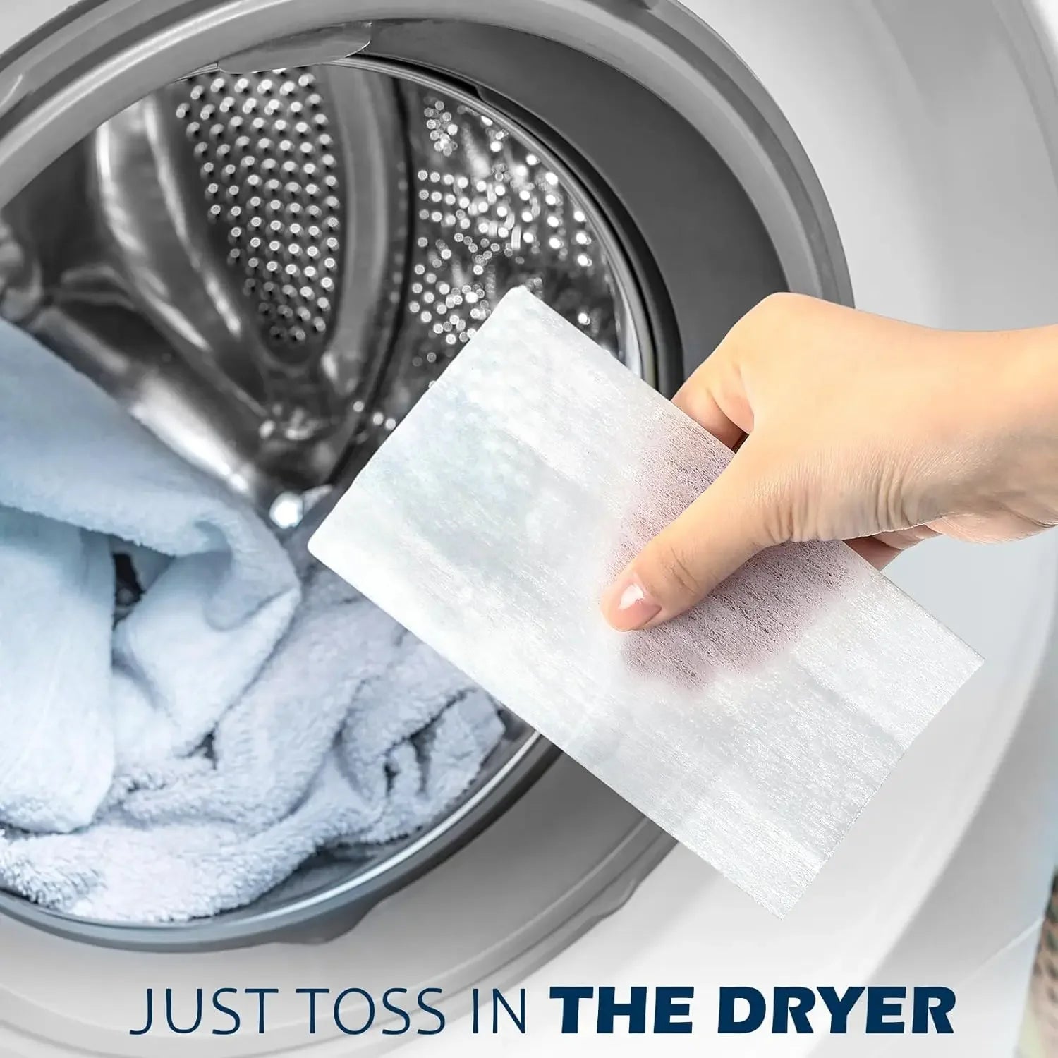 Hand holding a white dryer sheet with text 'Just toss in THE DRYER' over a washing machine.