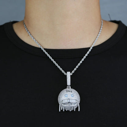 Silver robot pendant necklace on a person wearing a black shirt