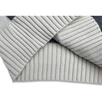 Close-up of gray ribbed fabric with a white background