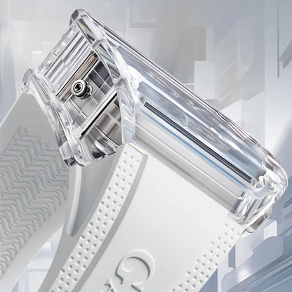 Clear plastic object on a textured white surface