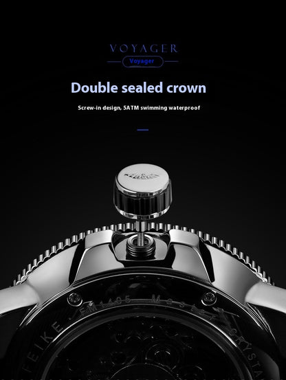Close-up of a watch crown with 'Voyager' branding on a black background