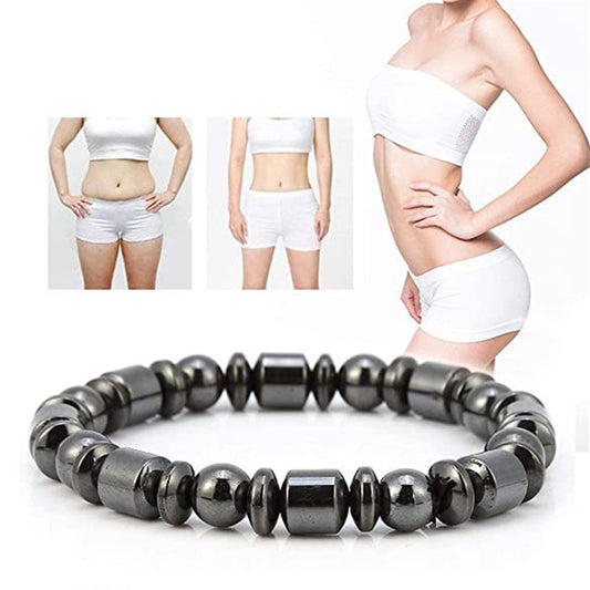Gray beaded bracelet with a person wearing white underwear in the background